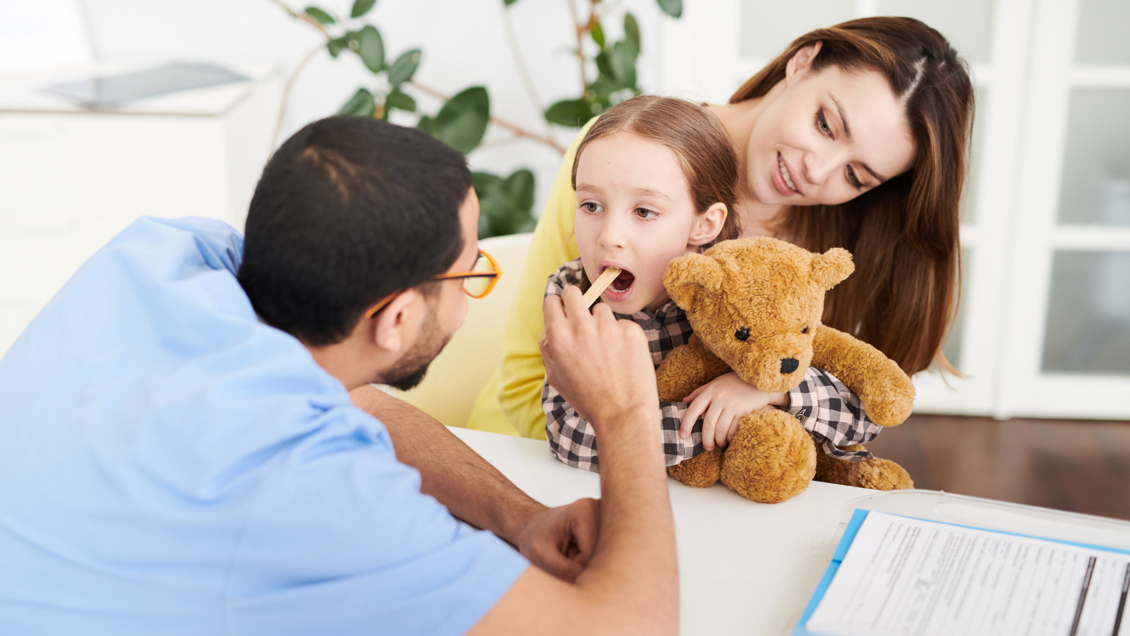 young girl having oral examination